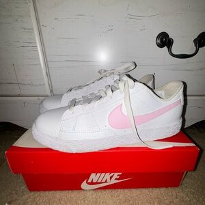 pink and white nikes forces